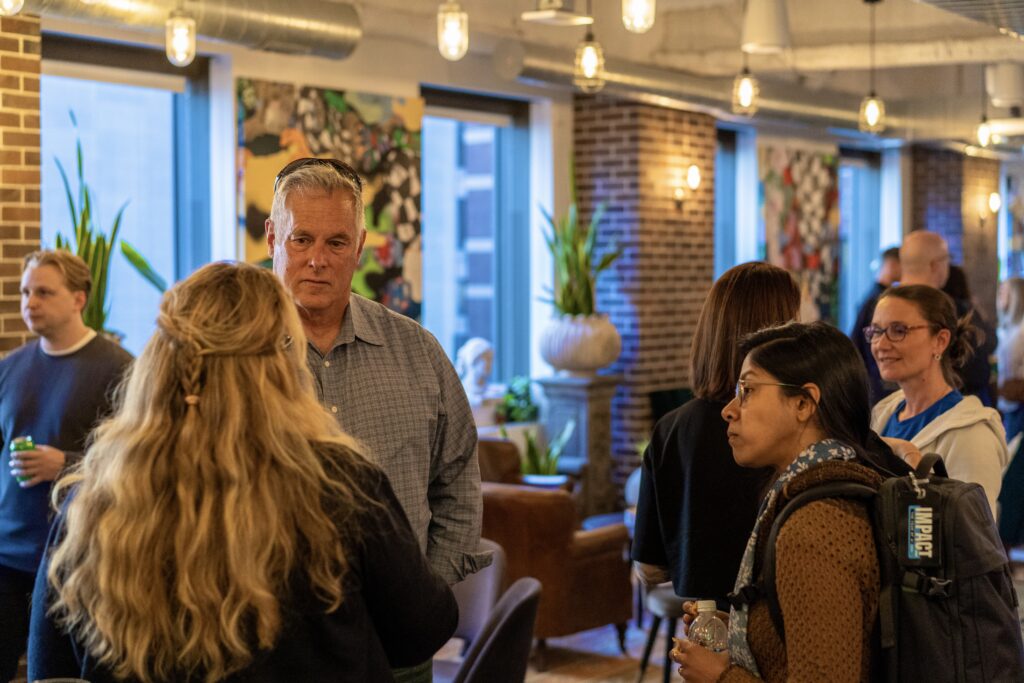 Conference attendees using a live attendee list to find relevant people for face-to-face conversations